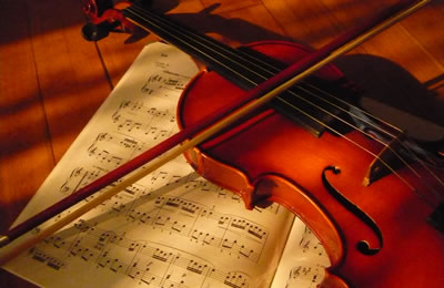 浅析小提琴断音弓法技巧之弓不离弦的『顿弓』